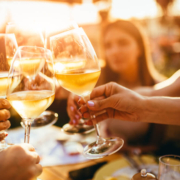 A group of people enjoying wine at a spot along the Leelanau Wine Trail.