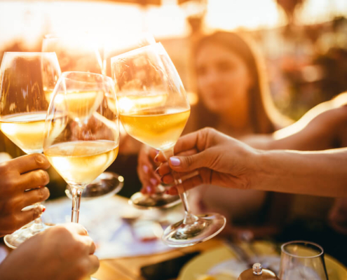A group of people enjoying wine at a spot along the Leelanau Wine Trail.