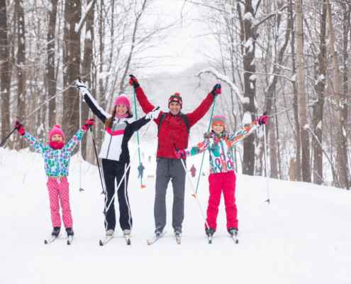 A family skiing on a Christmas vacation in Northern Michigan.